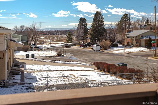 9486 Pelon Dr, Denver, CO 80260 - yard covered in snow featuring fence