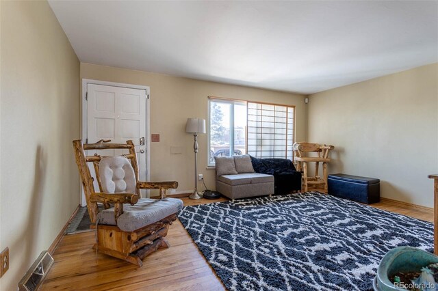 9486 Pelon Dr, Denver, CO 80260 - living area featuring wood finished floors and baseboards