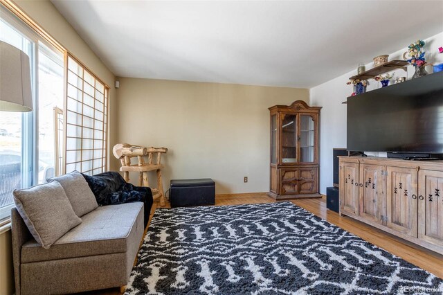 9486 Pelon Dr, Denver, CO 80260 - sitting room with light wood finished floors