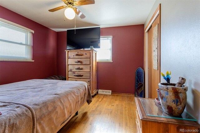 9486 Pelon Dr, Denver, CO 80260 - bedroom featuring light wood-type flooring, baseboards, and ceiling fan