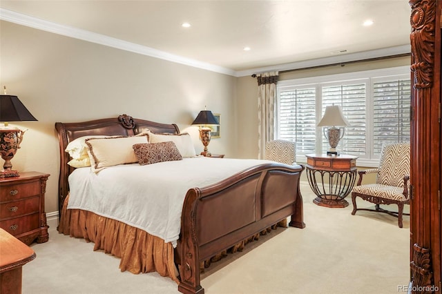 carpeted bedroom featuring ornamental molding and recessed lighting