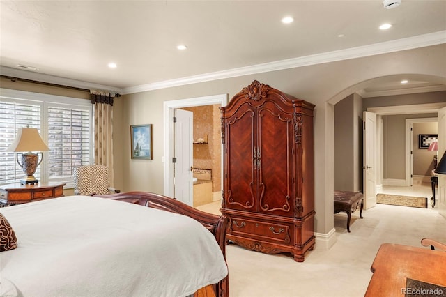 bedroom with light carpet, arched walkways, ensuite bathroom, recessed lighting, and crown molding