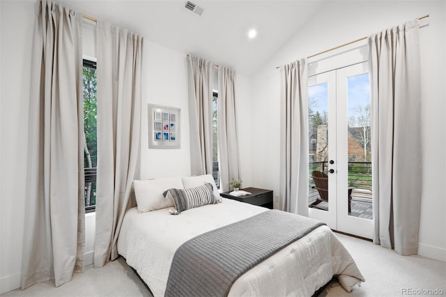 bedroom with french doors, light colored carpet, visible vents, vaulted ceiling, and access to exterior