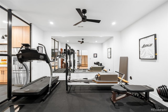 exercise room with baseboards, recessed lighting, visible vents, and ceiling fan