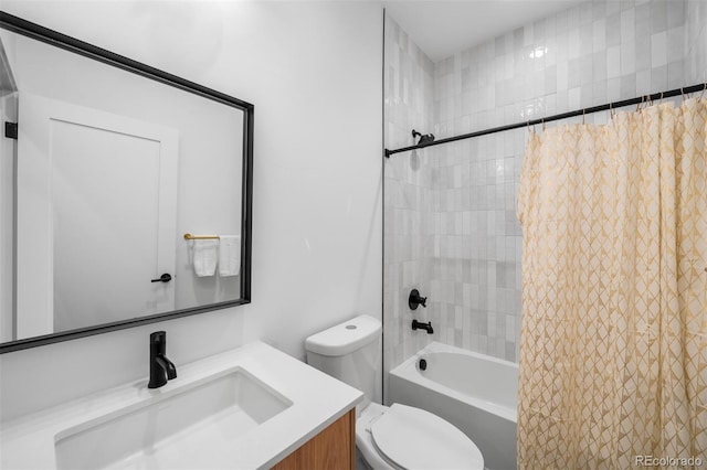 bathroom with toilet, vanity, and tub / shower combination