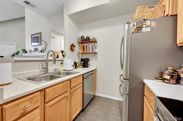 kitchen featuring a sink, appliances with stainless steel finishes, light countertops, light tile patterned floors, and open shelves