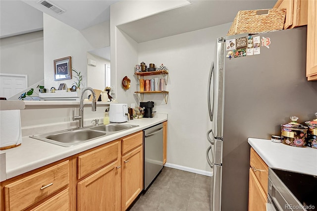 8371 S Upham Way Unit 208, Littleton, CO 80128 - kitchen with appliances with stainless steel finishes, a sink, light countertops, and light tile patterned flooring