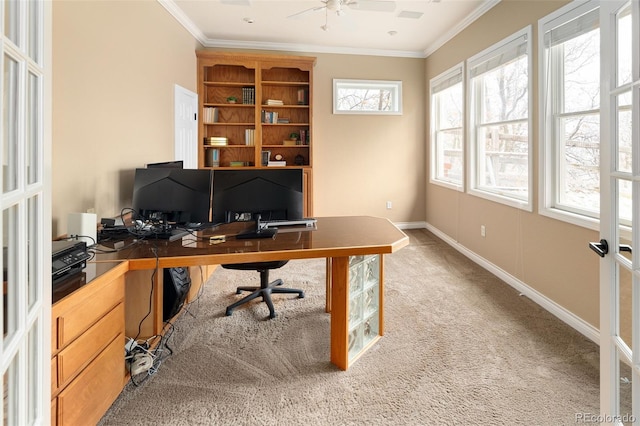 home office featuring a ceiling fan, baseboards, ornamental molding, french doors, and carpet flooring