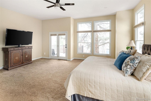 carpeted bedroom with baseboards, ceiling fan, and access to outside