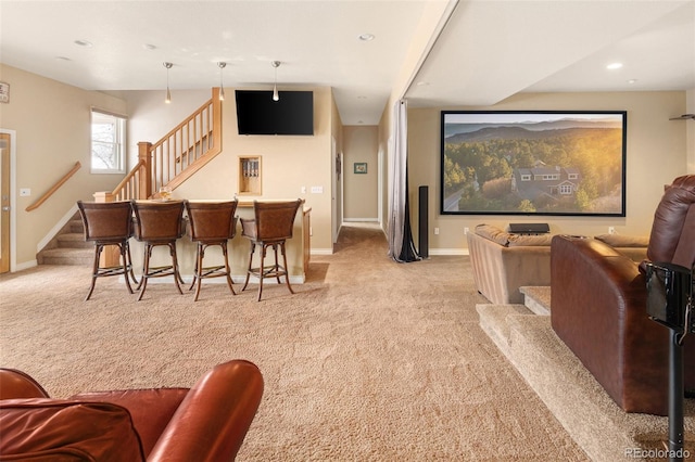 home theater room featuring recessed lighting, baseboards, and light carpet
