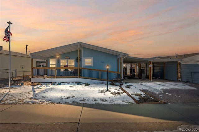 view of front of house with a carport