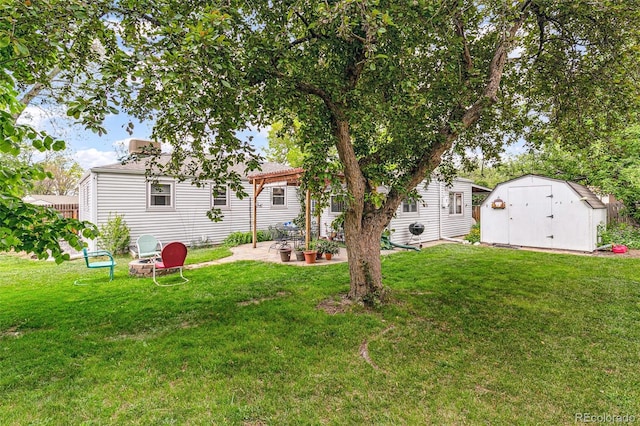 4285 Newland St, Wheat Ridge, CO 80033 - view of green lawn featuring a patio