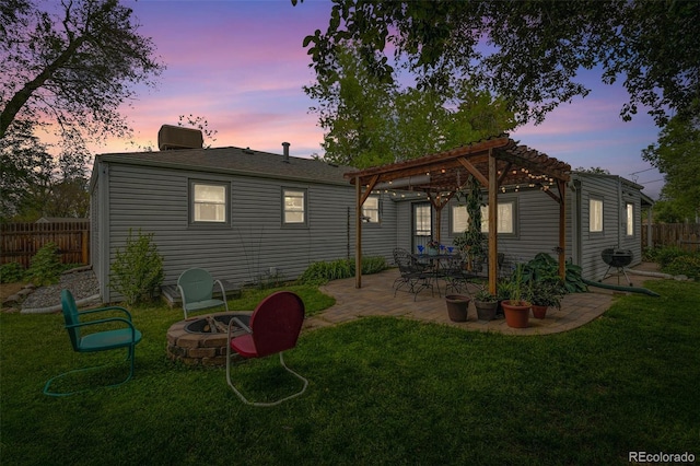 4285 Newland St, Wheat Ridge, CO 80033 - rear view of property featuring a pergola, an outdoor fire pit, a patio, and a chimney
