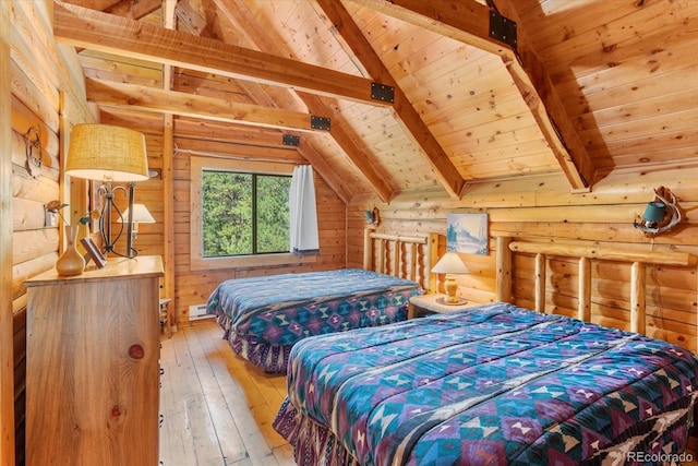 bedroom with log walls, hardwood / wood-style floors, vaulted ceiling with beams, and wood ceiling