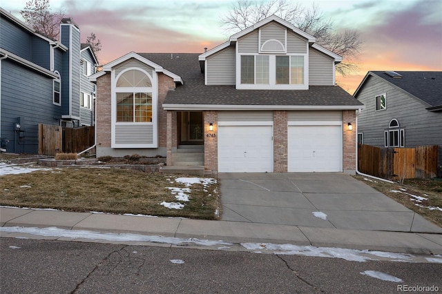 view of front of property with a garage