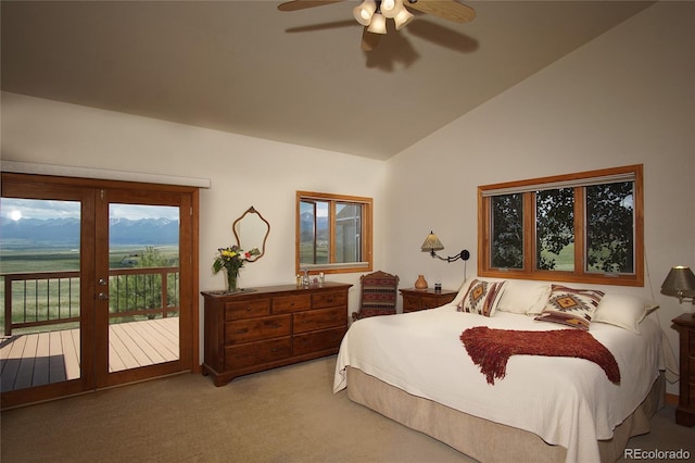 bedroom with vaulted ceiling, carpet floors, access to exterior, ceiling fan, and french doors