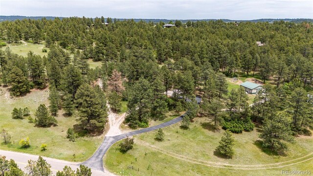 8788 E Tanglewood Rd, Franktown, CO 80116 - aerial overview of property's location featuring a heavily wooded area
