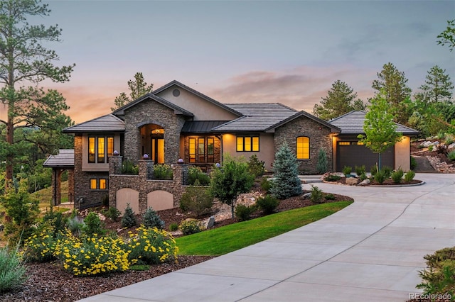 view of front of property featuring a garage