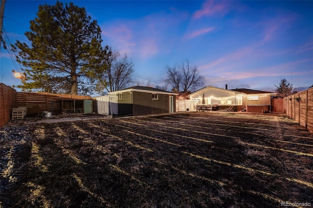 exterior space with a fenced backyard