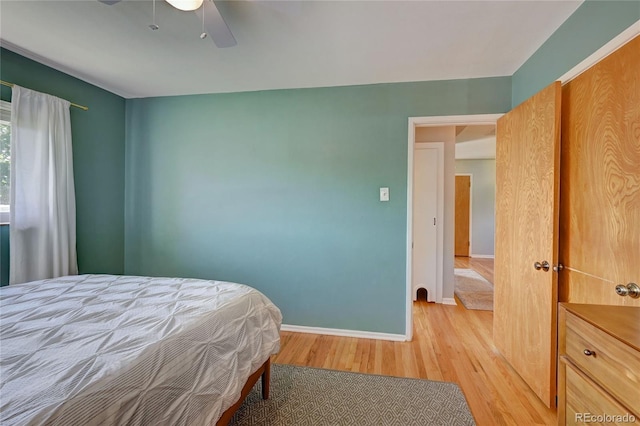 bedroom featuring ceiling fan and light wood-type flooring