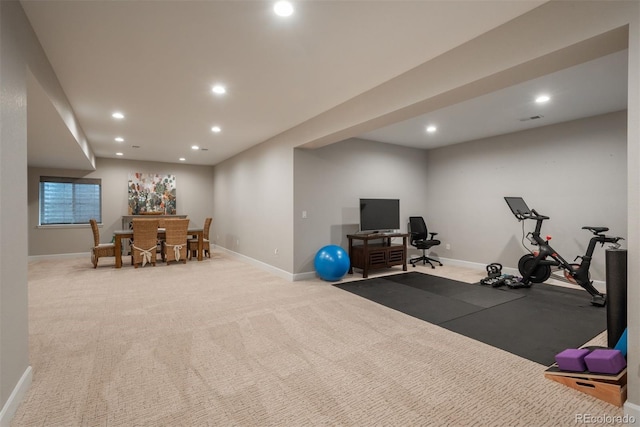 exercise area featuring baseboards, carpet floors, visible vents, and recessed lighting