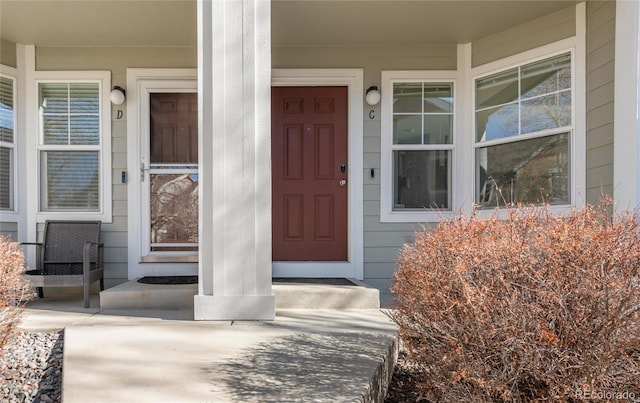 entrance to property with covered porch