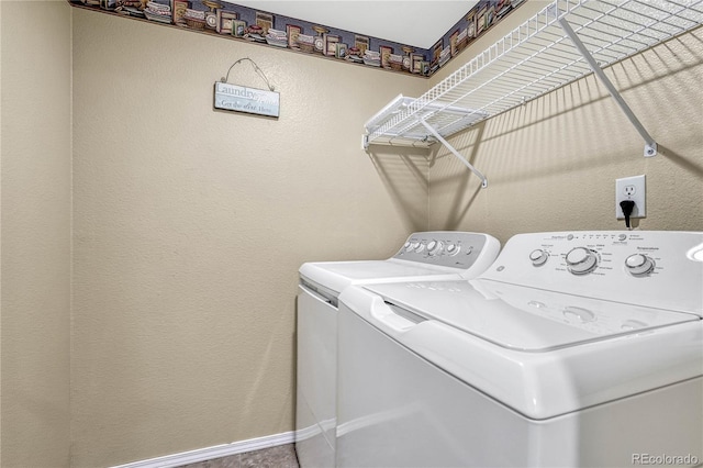 laundry area with separate washer and dryer