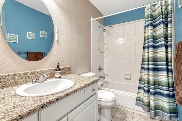 full bathroom featuring tile patterned flooring, vanity, toilet, and shower / bathtub combination with curtain