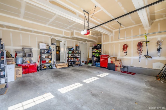 garage featuring a garage door opener