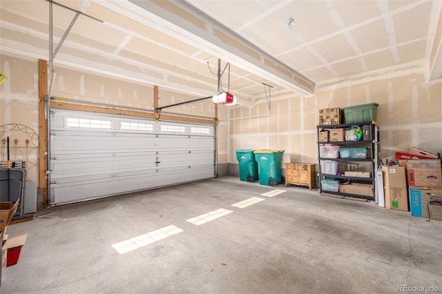 garage featuring a garage door opener