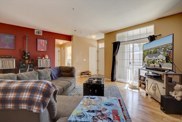 living room featuring light wood-type flooring