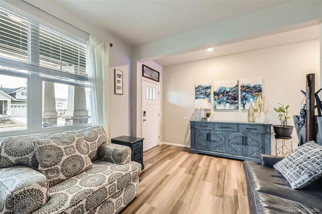 living room with light hardwood / wood-style floors