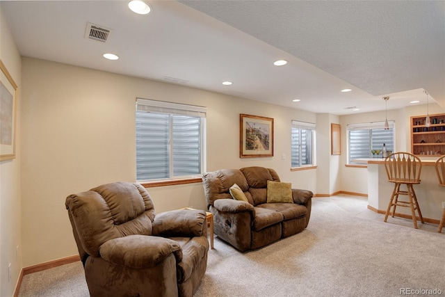 1825 Keota Ln, Superior, CO 80027 - living area with light carpet, recessed lighting, and baseboards