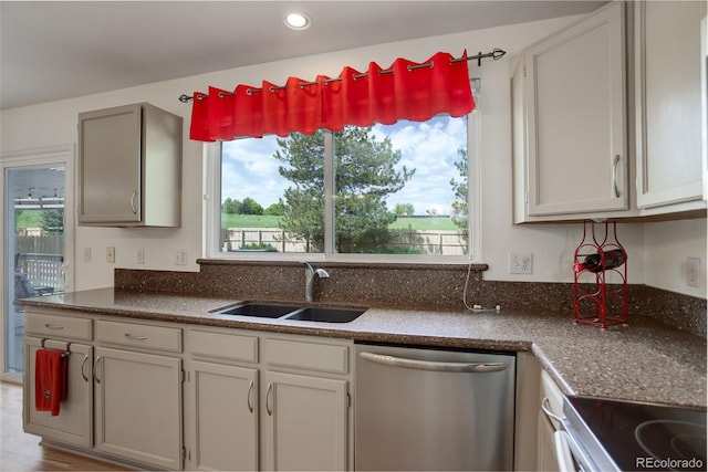 1825 Keota Ln, Superior, CO 80027 - kitchen featuring appliances with stainless steel finishes, a sink, healthy amount of natural light, and recessed lighting