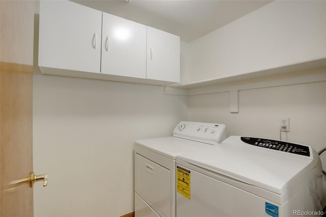 1825 Keota Ln, Superior, CO 80027 - laundry area featuring separate washer and dryer and cabinet space