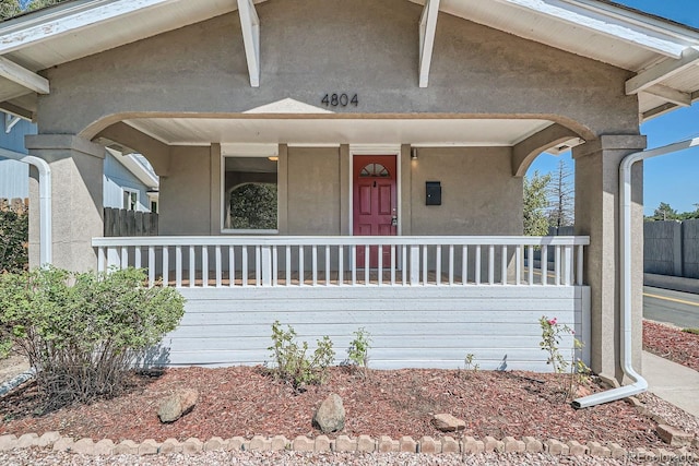 4804 N Raleigh St, Denver, CO 80212 - view of front of home featuring covered porch and stucco siding