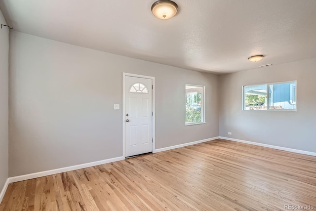 4804 N Raleigh St, Denver, CO 80212 - entryway featuring light wood finished floors and baseboards