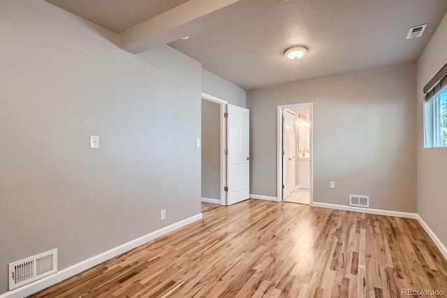 4804 N Raleigh St, Denver, CO 80212 - unfurnished room with light wood-style flooring and baseboards