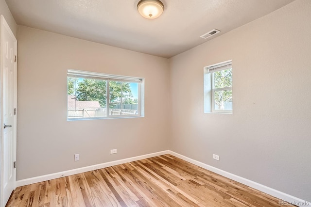 4804 N Raleigh St, Denver, CO 80212 - unfurnished room featuring baseboards and light wood finished floors