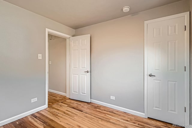 4804 N Raleigh St, Denver, CO 80212 - unfurnished room with light wood finished floors and a smoke detector