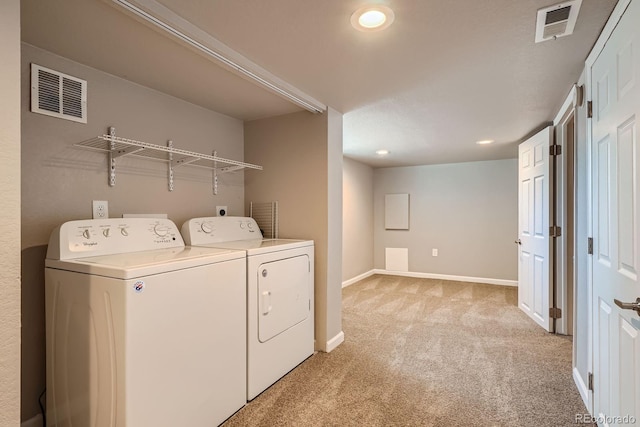4804 N Raleigh St, Denver, CO 80212 - laundry room featuring light colored carpet, washing machine and dryer, and recessed lighting