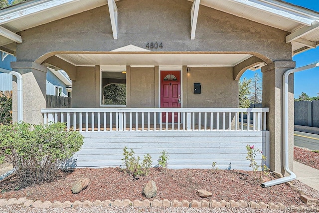 4804 N Raleigh St, Denver, CO 80212 - view of front of property with a porch and stucco siding
