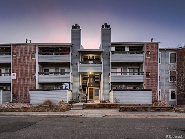 view of property at dusk