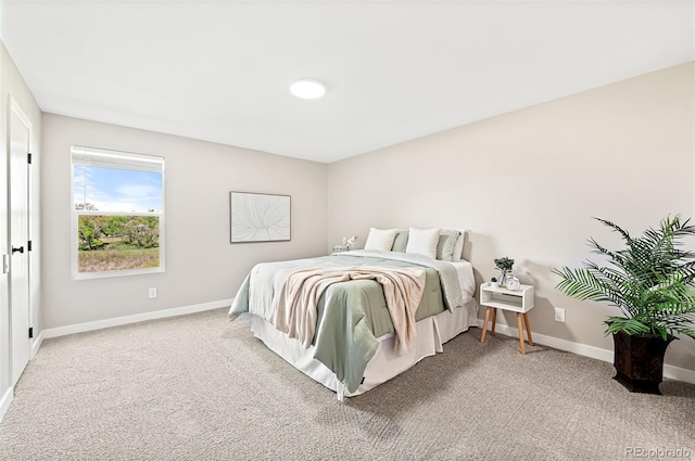 4274 S Salida Way Unit 3, Aurora, CO 80013 - carpeted bedroom featuring baseboards