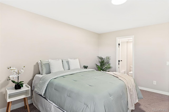 4274 S Salida Way Unit 3, Aurora, CO 80013 - carpeted bedroom featuring baseboards and ensuite bath