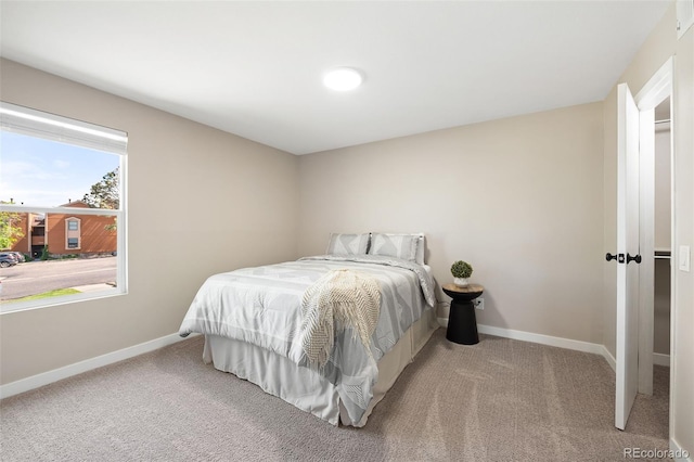4274 S Salida Way Unit 3, Aurora, CO 80013 - bedroom featuring carpet and baseboards