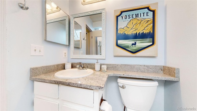 8701 Huron St Unit 1-207, Thornton, CO 80260 - bathroom featuring vanity and toilet