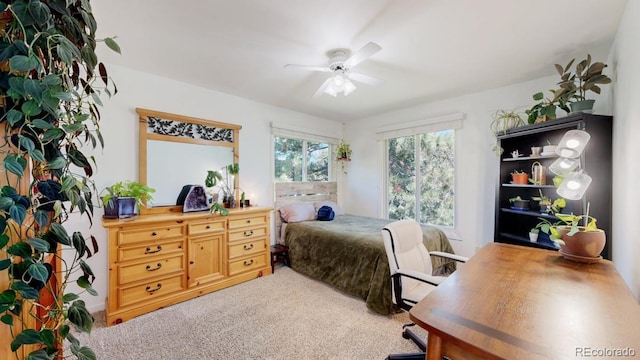 bedroom featuring carpet floors and a ceiling fan