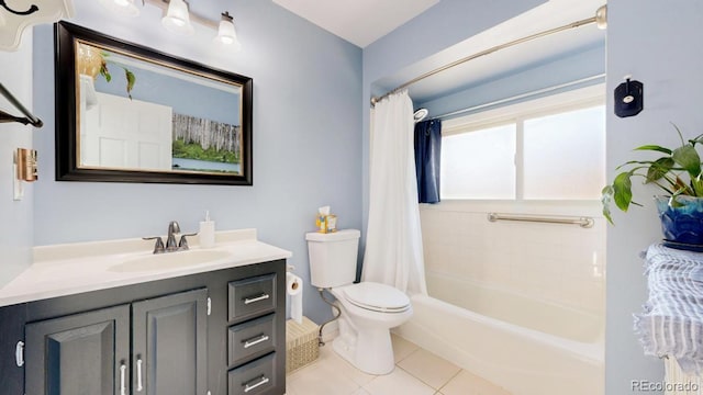 full bathroom featuring toilet, tile patterned flooring, vanity, and shower / bath combo