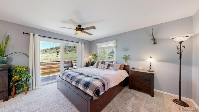 bedroom with light carpet, access to exterior, baseboards, and a ceiling fan
